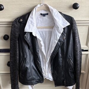 Black and Gray Women's Jacket thick fabric arms and leather front and back.